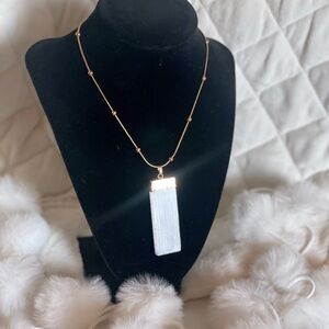 Elegant Gold Necklace with White Pendant